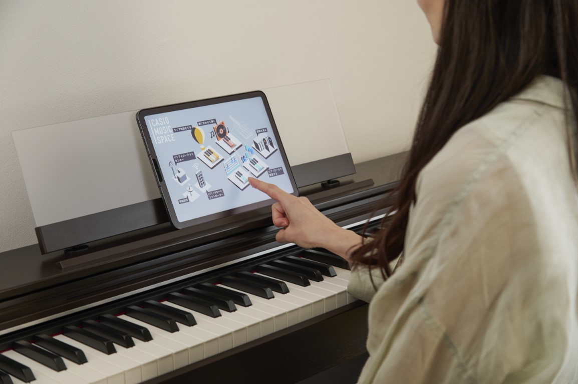 Skorzystaj z dołączonego „Bezprzewodowego adaptera MIDI